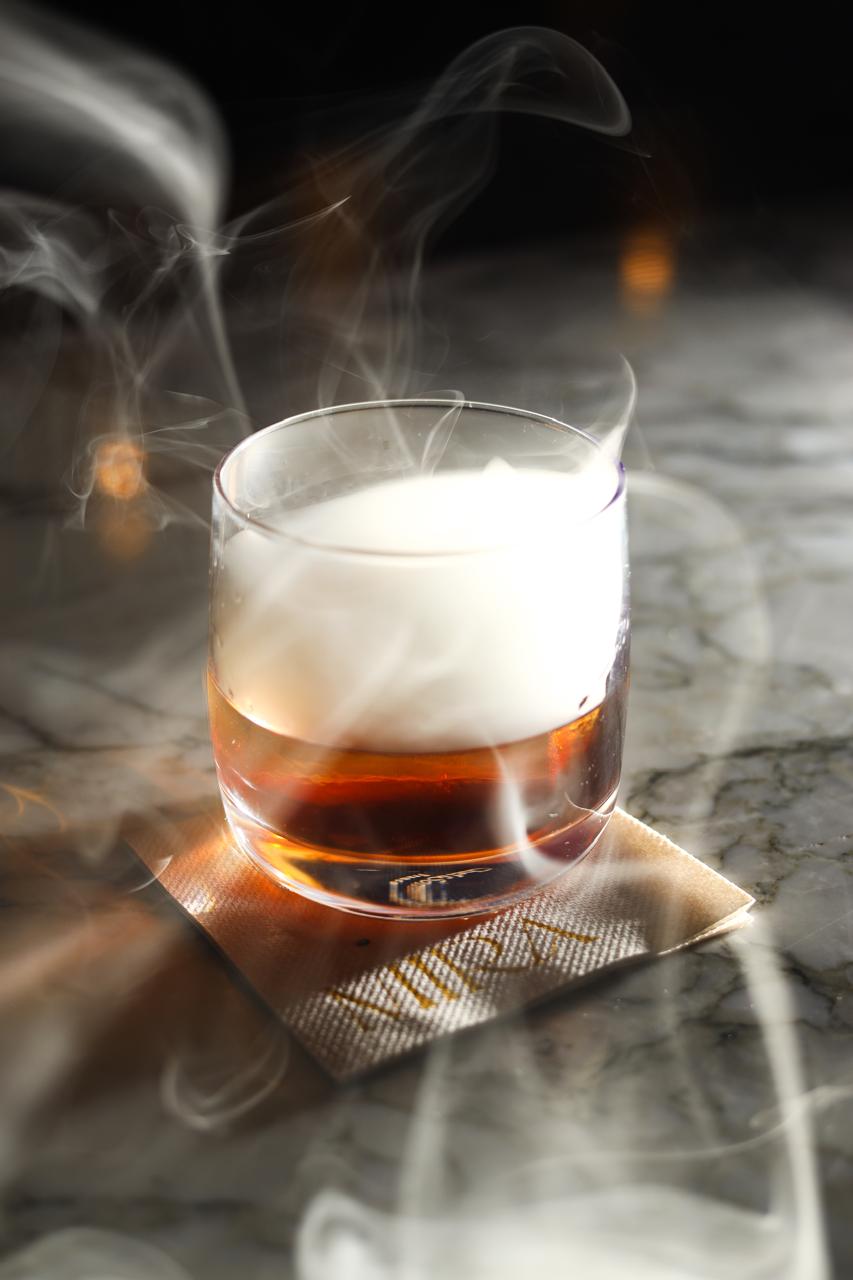 Smoked signature cocktail at MIRA Sandton